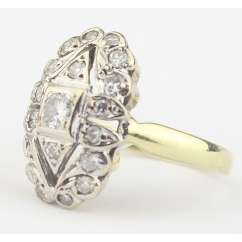 1104 - An Art Deco period 14ct gold and diamond set cluster ring, the central diamond assessed as approx 0.... 