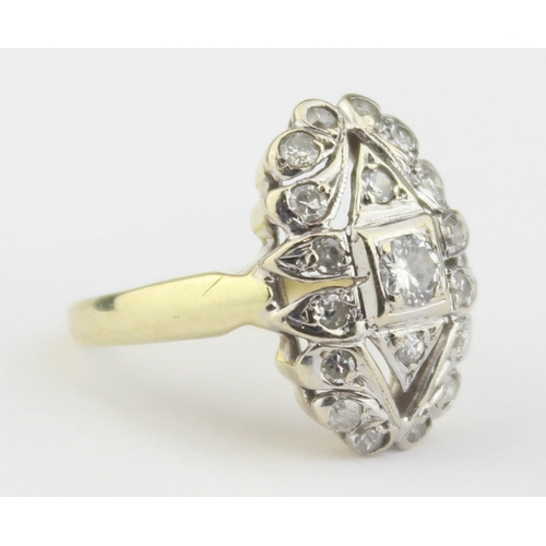 1104 - An Art Deco period 14ct gold and diamond set cluster ring, the central diamond assessed as approx 0.... 