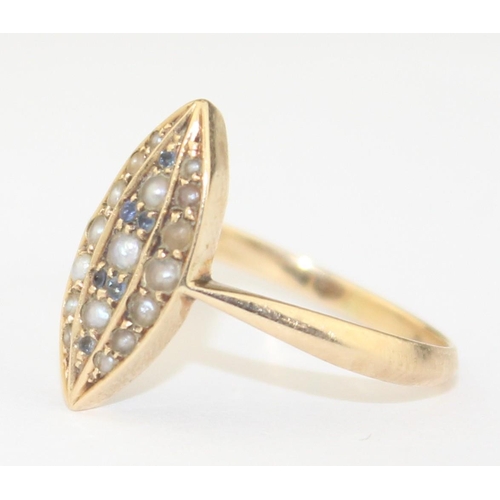 1105 - A vintage 14ct gold seed pearl and sapphire set navette ring, marked 585 and XRF confirmed, approx s... 