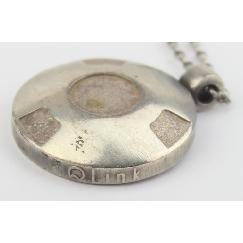 1110 - A vintage silver QLink pendant, believed to be the SRT3 energy pendant on silver chain, the chain ap... 