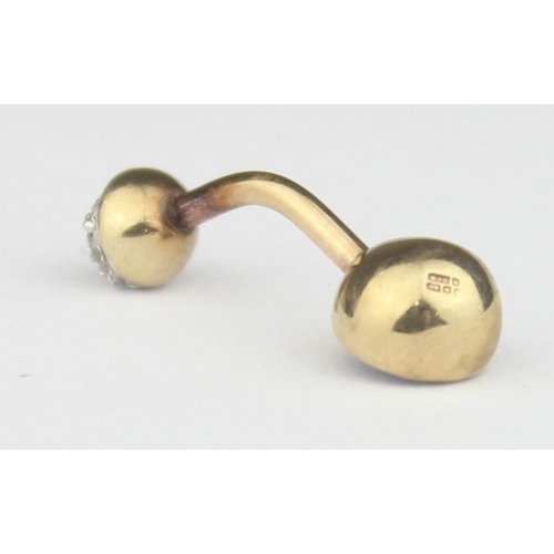 1113 - A 9ct gold navel barbell with facet cut stones, marked and XRF confirmed, approx 2.11g gross