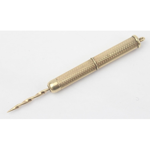 1121 - Asprey & Co, a vintage 9ct gold cigar piercer, marked for Birmingham 1967 by Asprey, approx 75mm whe... 