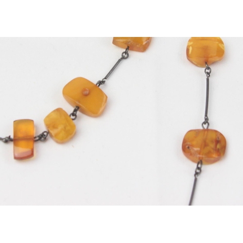 1126 - A silver and amber necklace and 2 silver mounted hardstone bead bracelets, one with a matching pair ... 