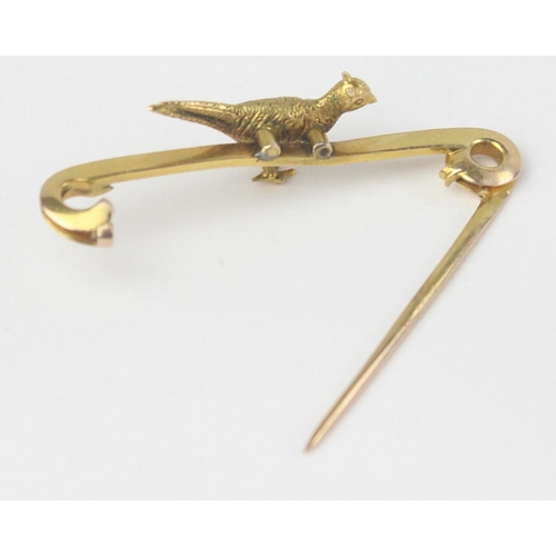 1129 - An antique yellow metal bar brooch formed as a pheasant, seemingly unmarked but XRF confirmed as 15c... 