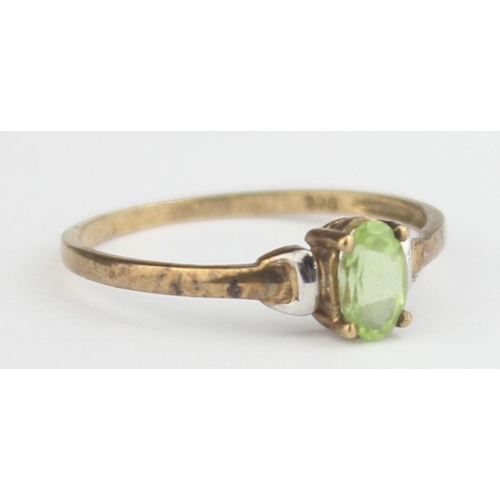 1134 - A 9ct gold and peridot ring, marked 9ct and XRF confirmed, approx size N, approx 0.91g gross