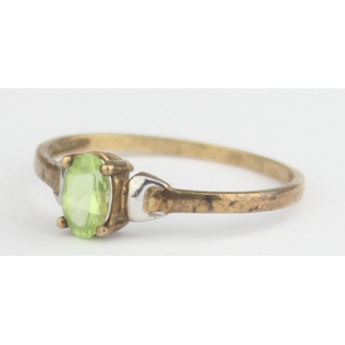 1134 - A 9ct gold and peridot ring, marked 9ct and XRF confirmed, approx size N, approx 0.91g gross