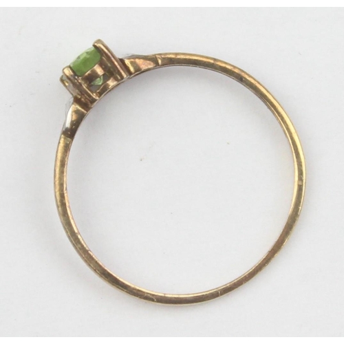 1134 - A 9ct gold and peridot ring, marked 9ct and XRF confirmed, approx size N, approx 0.91g gross