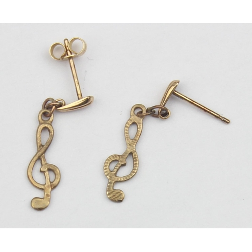 1136 - A pair of 9ct gold earrings formed as musical clefs, seemingly unmarked but XRF confirmed as 9ct gol... 