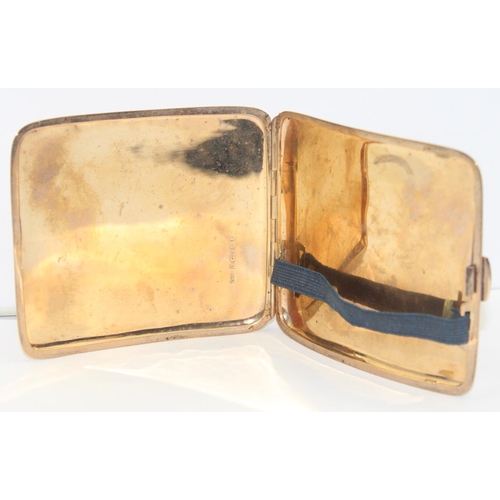 1149 - A 9ct gold cigarette case of plain curved form, Birmingham 1920 by Cohen & Charles, approx 95mm x 85... 