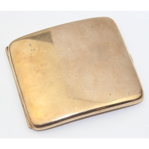 1149 - A 9ct gold cigarette case of plain curved form, Birmingham 1920 by Cohen & Charles, approx 95mm x 85... 