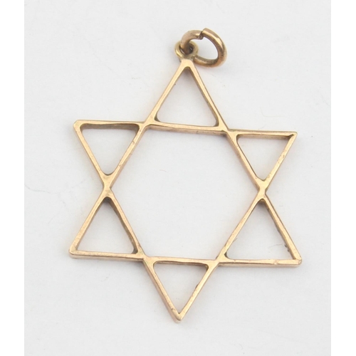 1151 - A vintage unmarked yellow metal Star of David pendant, seemingly unmarked but XRF testing as 15ct go... 