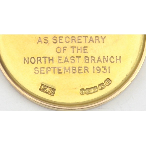 1153 - An early 20th century 9ct gold fob medal awarded by The Working Men's Club & Institute Ltd to a bran... 