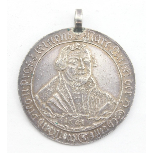 1231 - A rare antique silver medallion commemorating Martin Luther, dated 1661, XRF tests as approx 96% sil... 