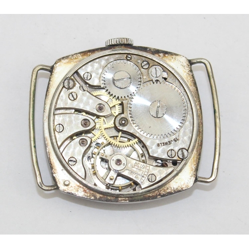 1307 - A vintage silver cased trench style watch with luminous hands and numbers, case import marked for Gl... 