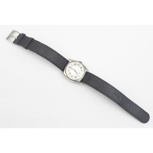 1307 - A vintage silver cased trench style watch with luminous hands and numbers, case import marked for Gl... 