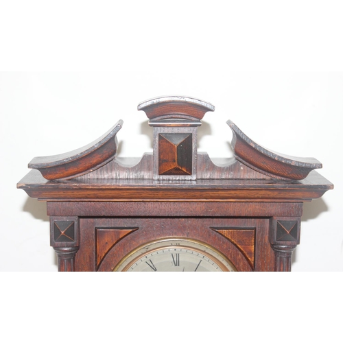 1325 - A vintage Lenzkirch of Germany oak cased mantel or bracket clock with key and pendulum, approx 40cm ... 