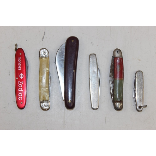 1433 - Qty of assorted vintage penknives, some lighters etc and an Oxford & Bucks Light Infantry matchbox c... 