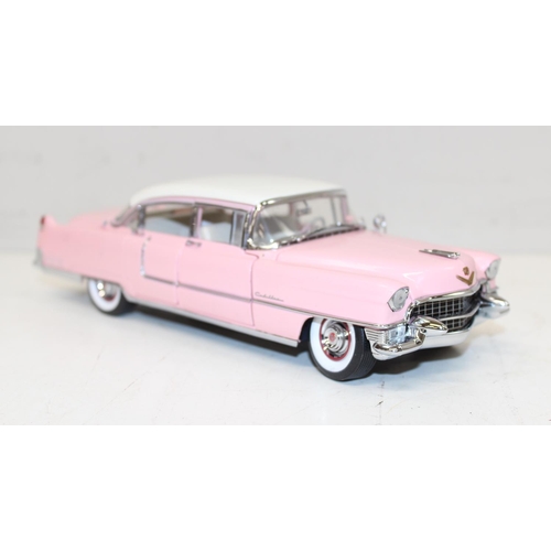 712 - Franklin Mint - a 1:24 scale model of Elvis Presley's 1955 pink Cadillac Fleetwood, with paperwork