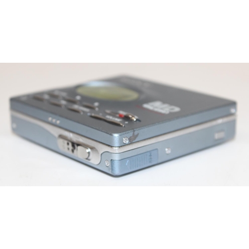 806 - Sony portable Minidisc recorder model MZ-R91 in carry case with a pair of MDR-A22 Headphones and 10 ... 