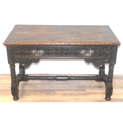 172 - A Jacobean or Carolean style carved oak hall or console table, likely early 20th century, with 2 dra... 