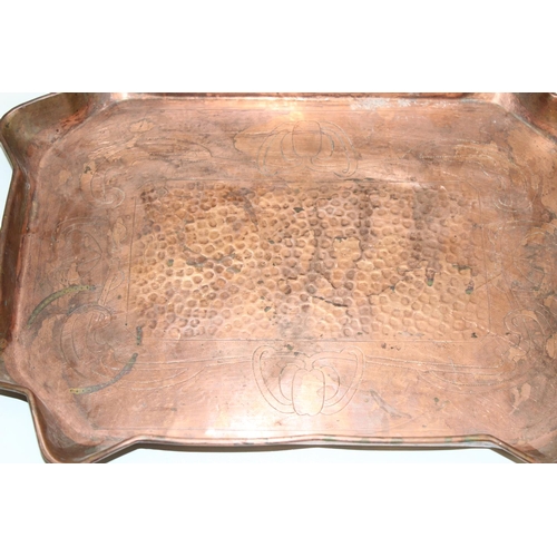 1716 - An Art Nouveau period copper serving tray in the manner of Keswick or Newlyn, marked only 