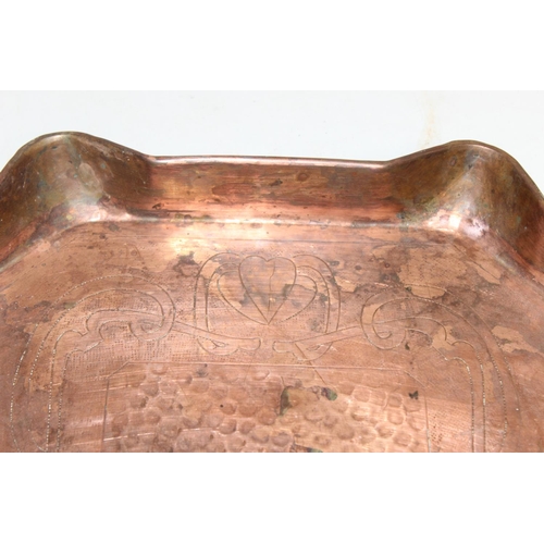 1716 - An Art Nouveau period copper serving tray in the manner of Keswick or Newlyn, marked only 