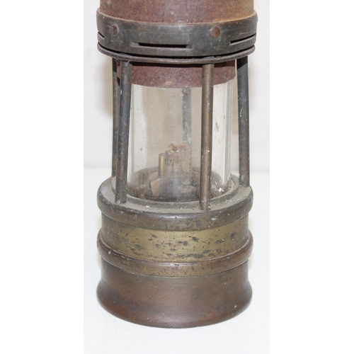 299A - A vintage miners lamp by Hailwood & Ackroyd of Leeds, with original name plate, approx 26cm tall exc... 