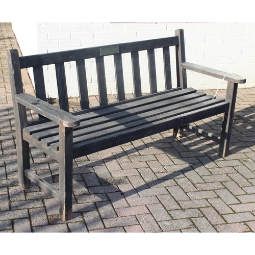 357 - A wooden garden bench, approx 158cm wide, with plaque