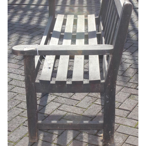 357 - A wooden garden bench, approx 158cm wide, with plaque