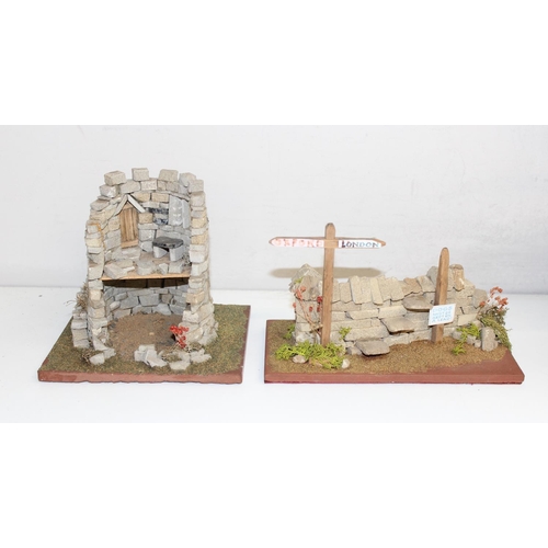 713 - Qty of assorted hand built models and canons etc to inc stone buildings, canons and a battering ram ... 