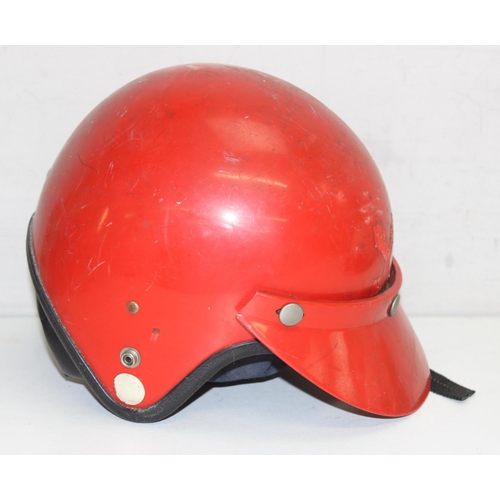 802 - 3 vintage motorcycle helmets to inc 