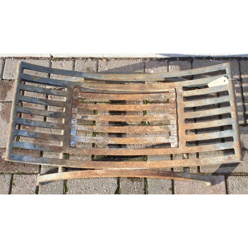 358 - A iron fire grate or basket of curved form, approx 77cm wide