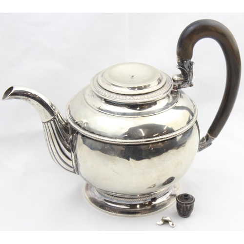 1065 - An early 19th century German silver teapot of rounded form, various marks to base including the Dres... 