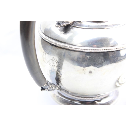 1065 - An early 19th century German silver teapot of rounded form, various marks to base including the Dres... 