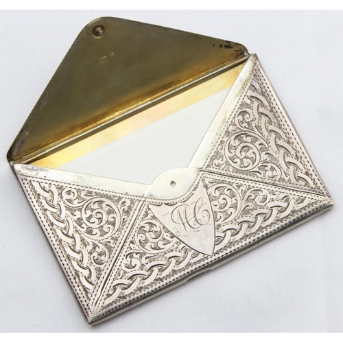 1068 - An Edwardian silver card case formed as an envelope with profuse engraved decoration, marked for Bir... 