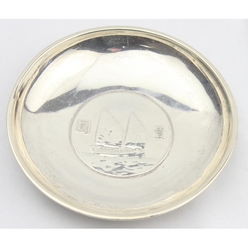 1078 - A vintage silver dish set with a Chinese silver Junk dollar coin, marked Sterling and Wai Kee of Hon... 