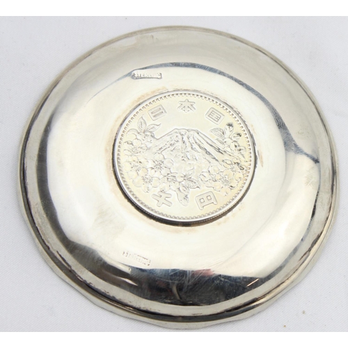 1079 - A vintage silver dish set with a Japanese 1964 Olympic commemorative 1000 yen coin, marked Sterling ... 