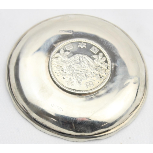 1079 - A vintage silver dish set with a Japanese 1964 Olympic commemorative 1000 yen coin, marked Sterling ... 