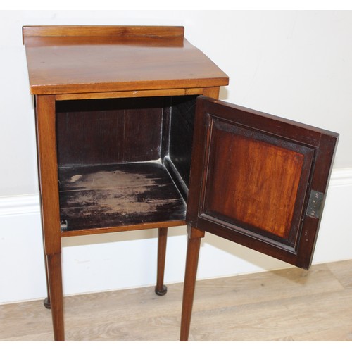 145 - An early 20th century mahogany pot cupboard or bedside table, approx 38cm wide x 33cm deep x 78cm ta... 