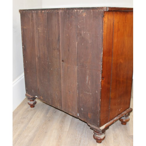 168 - An unusual Victorian mahogany chest of drawers with cross banded details, 4 drawer construction with... 