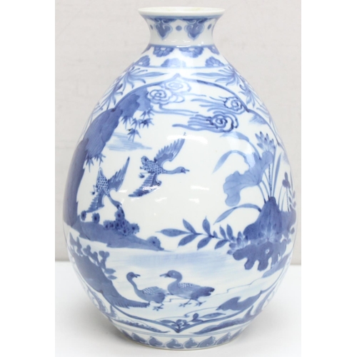 1478 - A large Chinese blue and white vase of bulbous form, decorated with birds in a landscape, 6 characte... 