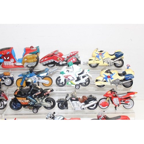 705 - Large qty of vintage toy motorbikes and vehicles to include Batman and Power Rangers