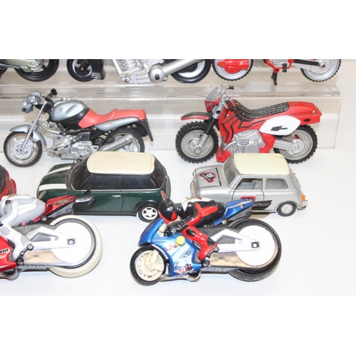 705 - Large qty of vintage toy motorbikes and vehicles to include Batman and Power Rangers