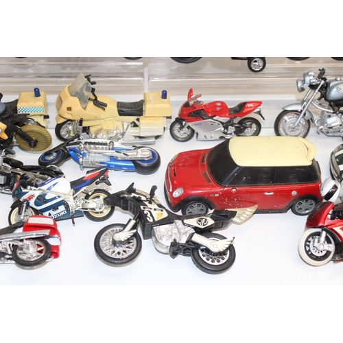 705 - Large qty of vintage toy motorbikes and vehicles to include Batman and Power Rangers