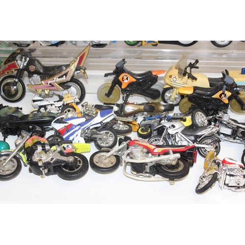 705 - Large qty of vintage toy motorbikes and vehicles to include Batman and Power Rangers