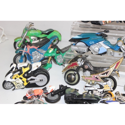 705 - Large qty of vintage toy motorbikes and vehicles to include Batman and Power Rangers