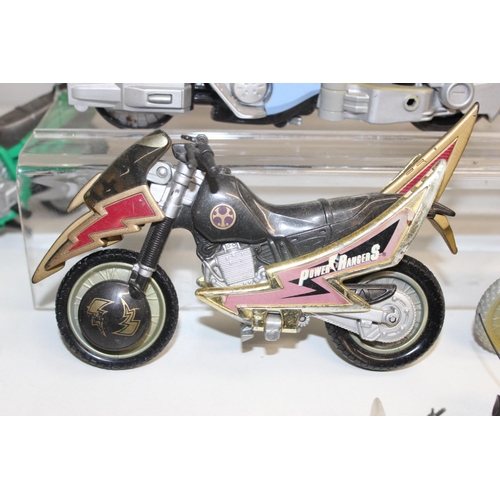 705 - Large qty of vintage toy motorbikes and vehicles to include Batman and Power Rangers