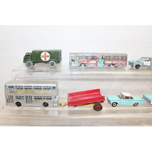 708 - A large qty of assorted vintage Dinky Toys die-cast vehicles, playworn