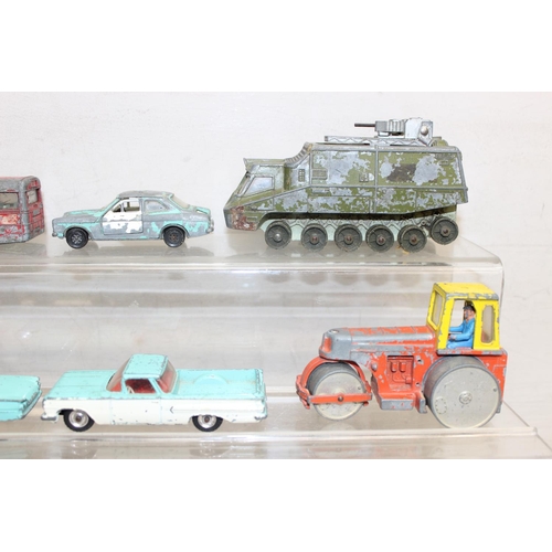 708 - A large qty of assorted vintage Dinky Toys die-cast vehicles, playworn