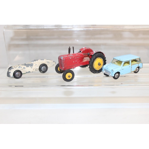 708 - A large qty of assorted vintage Dinky Toys die-cast vehicles, playworn